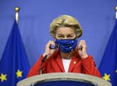 European Commission president Ursula von der Leyen takes off her protective mask prior to making a statement regarding the Withdrawal Agreement at EU headquarters in Brussels. Picture: Johanna Geron, Pool via AP