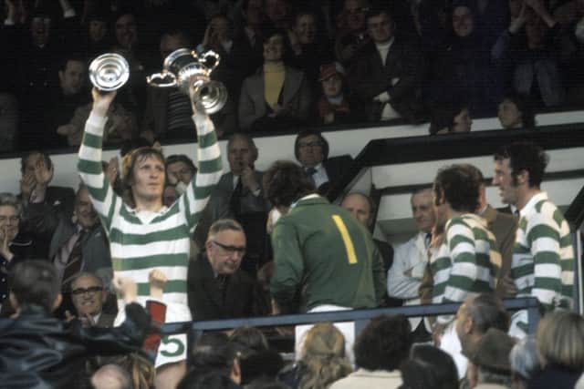 Captain Billy McNeill lifts the Scottish Cup after his last match for Celtic against Airdrie in 1975