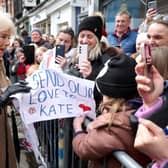 Queen Camilla receives a message of support for the Princess of Wales from well-wishers during a visit to the Farmers' Market in The Square, Shrewsbury. Photo: Chris Jackson/PA Wire