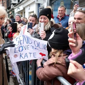Queen Camilla receives a message of support for the Princess of Wales from well-wishers during a visit to the Farmers' Market in The Square, Shrewsbury. Photo: Chris Jackson/PA Wire