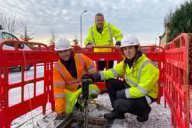 Robert Thorburn (centre) watches engineers Lucy Kennedy and Jodine Crombie as they work on Scotland’s new full fibre network