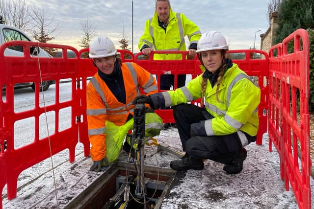 Robert Thorburn (centre) watches engineers Lucy Kennedy and Jodine Crombie as they work on Scotland’s new full fibre network