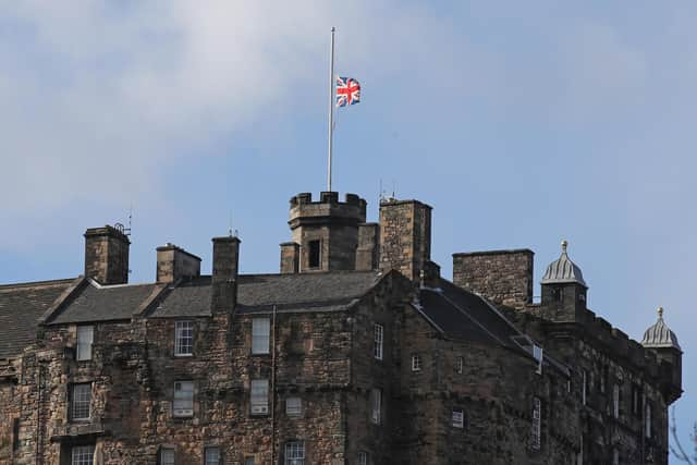 The Union flag flies at half mast over Edinburgh Castle (Photo: Andrew Milligan/PA Wire)