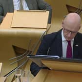John Swinney speaking at FMQs at the Scottish Parliament on Thursday (Photo: Scottish Parliament).