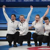 Gold medallists Britain's Eve Muirhead, Vicky Wright, Jennifer Dodds, Hailey Duff, Mili Smith pose ahead of the women's curling victory ceremony at the Beijing 2022 Winter Olympic Games at the National Aquatics Centre in Beijing on February 20, 2022. (Photo by JEFF PACHOUD/AFP via Getty Images)