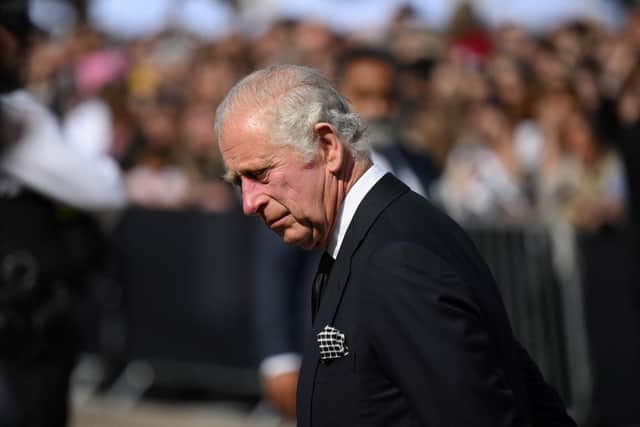King Charles III views tributes upon arrival Buckingham Palace in London. Picture: Daniel Leal/AFP via Getty Images