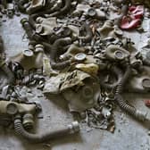 Abandoned gas masks on the floor in a school in the deserted town of Prypyat, adjacent to the Chernobyl nuclear site (Picture: Sergey Supinski/AFP via Getty Images)