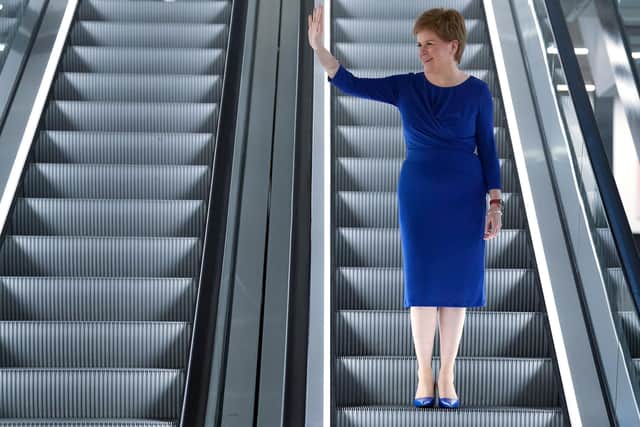 First Minister Nicola Sturgeon on a escalator on her way to the exhibitors hall at the SNP conference at The Event Complex Aberdeen (TECA) in Aberdeen , Scotland. Picture date: Sunday October 9, 2022.