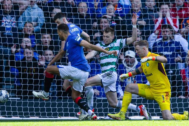 Rangers' Cyriel Dessers scores before his goal is ruled out for a foul on Celtic's Tomoki Iwata after a VAR check. (Photo by Craig Foy / SNS Group)