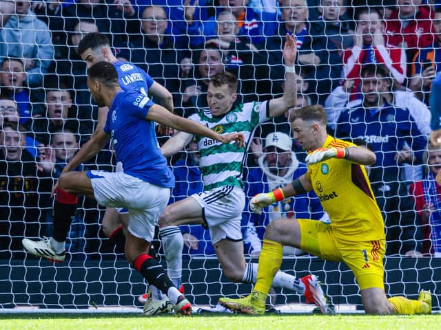 Rangers' Cyriel Dessers scores before his goal is ruled out for a foul on Celtic's Tomoki Iwata after a VAR check. (Photo by Craig Foy / SNS Group)