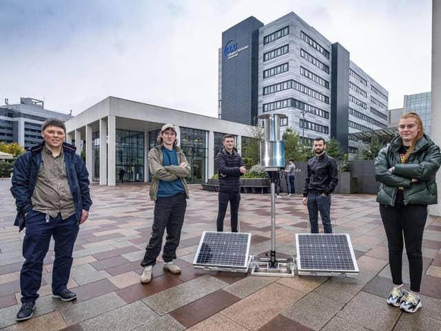 Dr Andrew Cowell with student engineers Scott McCulloch, Adam Friend, Jamie Whitehead and Rebekah Edgar with a flatpack wind turbine invented by by Douglas Macartney,. It has since been developed into a viable prototype by several teams of undergraduate engineers from Glasgow Caledonian University.