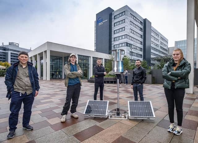 Dr Andrew Cowell with student engineers Scott McCulloch, Adam Friend, Jamie Whitehead and Rebekah Edgar with a flatpack wind turbine invented by by Douglas Macartney,. It has since been developed into a viable prototype by several teams of undergraduate engineers from Glasgow Caledonian University.