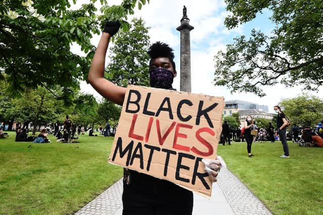 A Black Lives Matter protest at the Melville Monument, which holds the statue of Henry Dundas (Lisa Ferguson)