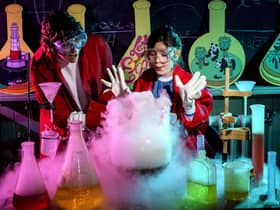 Stephanie Maia and her daughter Valentina experimen with dry ice at Summerhall, one of the venues in this year's Edinburgh Science Festival. Picture: Ian Georgeson