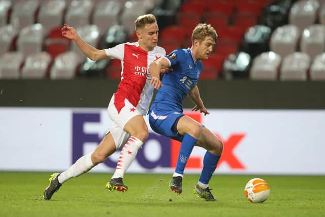 Rangers goalscorer Filip Helander holds off Slavia Prague striker Jan Kuchta during the 1-1 draw at the Eden Arena. (Photo by MILAN KAMMERMAYER/AFP via Getty Images)