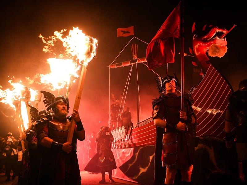 Participants take part in the Up Helly Aa festival parade through the streets of Lerwick, Shetland Islands on January 31, 2023. Photo by Andy Buchanan / AFP