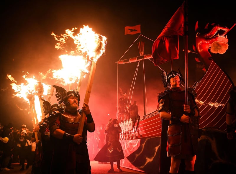 Participants take part in the Up Helly Aa festival parade through the streets of Lerwick, Shetland Islands on January 31, 2023. Photo by Andy Buchanan / AFP