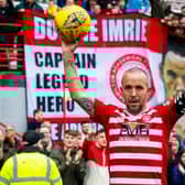 Dougie Imrie at the end of his final game before retirement in May last year. Picture: SNS