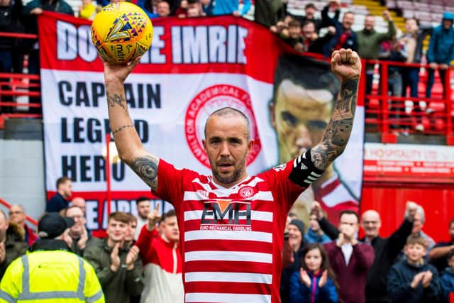 Dougie Imrie at the end of his final game before retirement in May last year. Picture: SNS