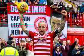 Dougie Imrie at the end of his final game before retirement in May last year. Picture: SNS