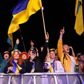 The crowd watching Kalush Orchestra, Eurovision winners from Ukraine, performing, during the Glastonbury Festival, as a UK-based think tank and charity has called for Ukrainian refugees and their UK host families to be given "priority tickets" to Eurovision 2023.