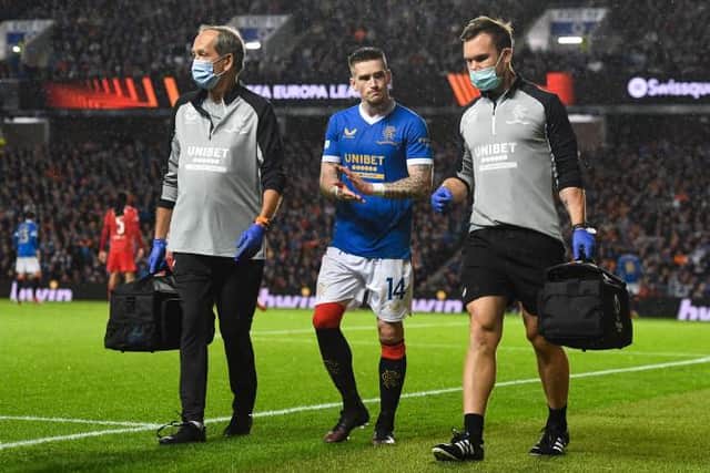 Rangers winger Ryan Kent leaves the field after suffering a hamstring injury during the Europa League defeat against Lyon at Ibrox. (Photo by Craig Foy / SNS Group)