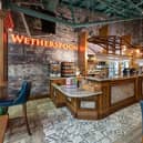 Pub chain JD Wetherspoon is to open 60 of its pubs in Scotland next month.