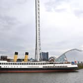 TS Queen Mary berthed beside Glasgow Science Centre on Friday. Picture: John Devlin