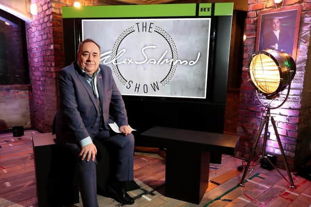 Vladimir Putin's invasion of Ukraine prompted Alex Salmond to merely 'suspend' his chat show on Russia's state-run RT channel (Chris Radburn/PA)