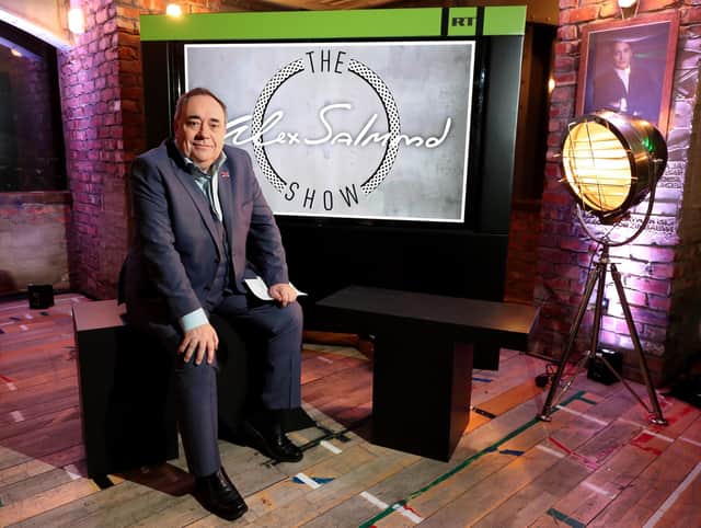 Vladimir Putin's invasion of Ukraine prompted Alex Salmond to merely 'suspend' his chat show on Russia's state-run RT channel (Chris Radburn/PA)