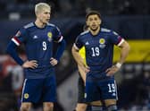 Scotland's Lyndon Dykes (left) and Che Adams are vying for the same spot in attack.
