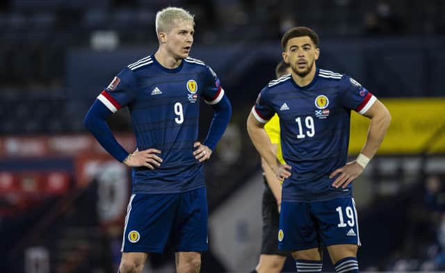 Scotland's Lyndon Dykes (left) and Che Adams are vying for the same spot in attack.