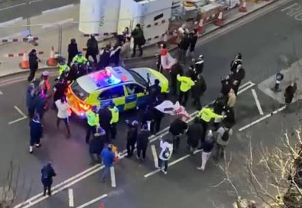 Protesters clashed with police as Mr Starmer was escorted away.