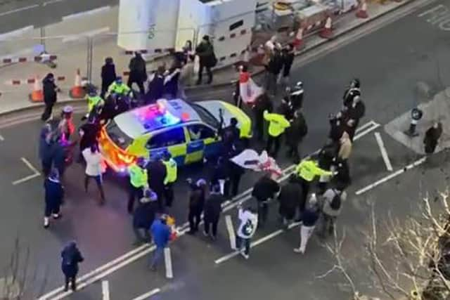 Protesters clashed with police as Mr Starmer was escorted away.