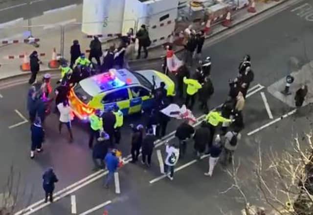 Protesters clashed with police as Mr Starmer was escorted away.