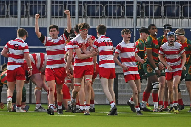 Loretto celebrate scoring a try during the under-18s Shield final