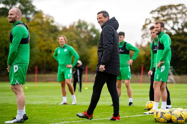 Hibs manager Jack Ross enjoying time with his players on the training pitch. Photo by Ross MacDonald / SNS Group