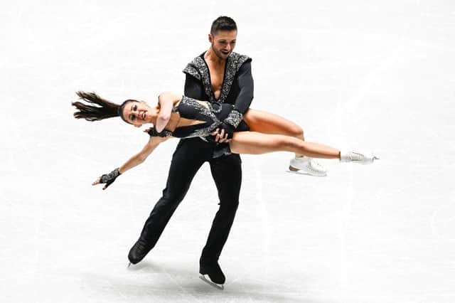 Lilah Fear and Lewis Gibson compete in the ice rhythm dance competition during the Grand Prix of Figure Skating NHK Trophy in Tokyo.