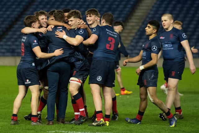 Merchiston's players celebrate at full-time after the under-18s cup final
