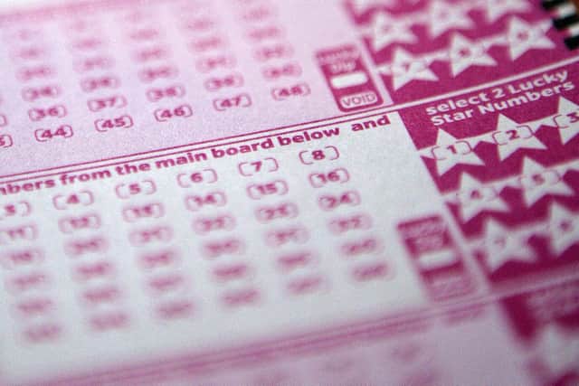 National Lottery are on the hunt for an unclaimed millionaire