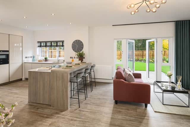 The spacious homes boast five double bedrooms, modern open-plan living spaces, large private gardens and detached garages