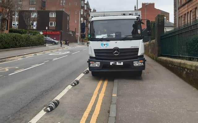 A delivery lorry blocking a new segregated cycle lane outside a Glasgow school this week. (Picture: The Scotsman)