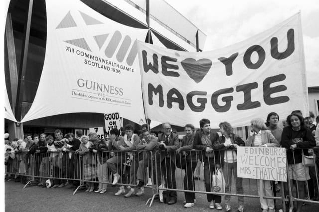 A pro-Thatcher crowd waits to welcome Prime Minister Margaret Thatcher to the Edinburgh Commonwealth Games.
