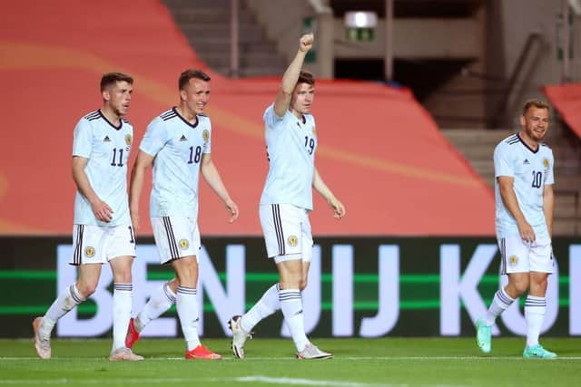 Kevin Nisbet of Scotland celebrates after scoring his  side's second goal during the international friendly match between Netherlands and Scotland at Estadio Algarve on June 02, 2021 in Faro, Portugal. (Photo by Fran Santiago/Getty Images)