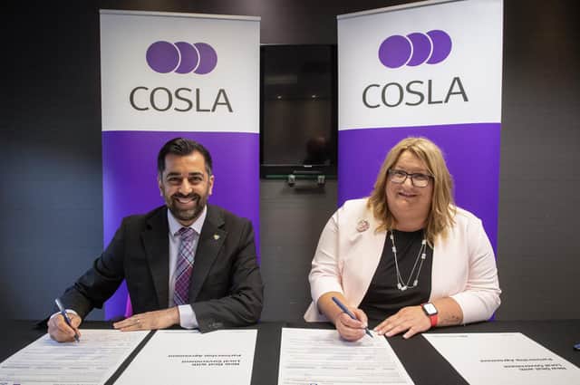 First Minister Humza Yousaf and the Convention of Scottish Local Authorities (COSLA) President, Shona Morrison, sign the agreement