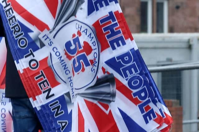 A woman has been seriously injured in an attack by another woman who was draped in a Rangers FC flag. Picture: Robert Perry/PA Wire