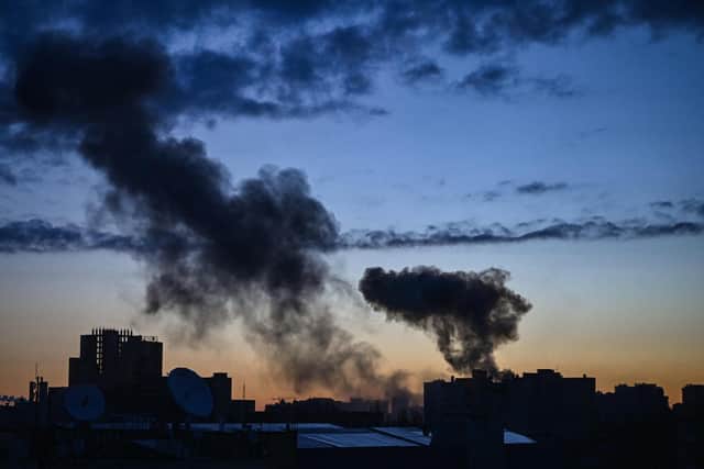 This photograph taken on March 16, 2022 shows smoke rising after an explosion in Kyiv. Several explosions rocked Kyiv early March 16, 2022, according to AFP journalists in the city, with emergency services saying two residential buildings were damaged and two people wounded. The blasts came as Russia intensifies attacks on the Ukrainian capital, which was placed under curfew late March 15, 2022 due to what its mayor called a "difficult and dangerous moment". PIC: Aris Messinis / AFP via Getty Images