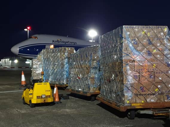 A charter flight carrying personal protective equipment (PPE) and NHS supplies arrives at Prestwick Airport from China (Picture: Scottish Government)