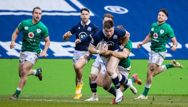 Scotland's Huw Jones drives through for a try during the Guinness Six Nations match between Scotland and Ireland at BT Murrayfield (Photo by Craig Williamson / SNS Group)