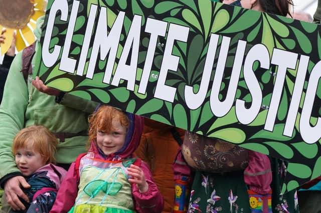 Climate Justice Activists at the Cop26 Gates asking delegates as they make final decisions, "Are You With Us Or With Fossil Fuels?"